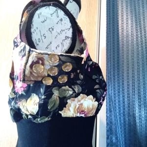 A cold shouldered Blouse with a matching skirt